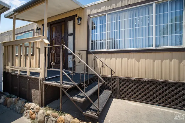 a view of balcony with furniture