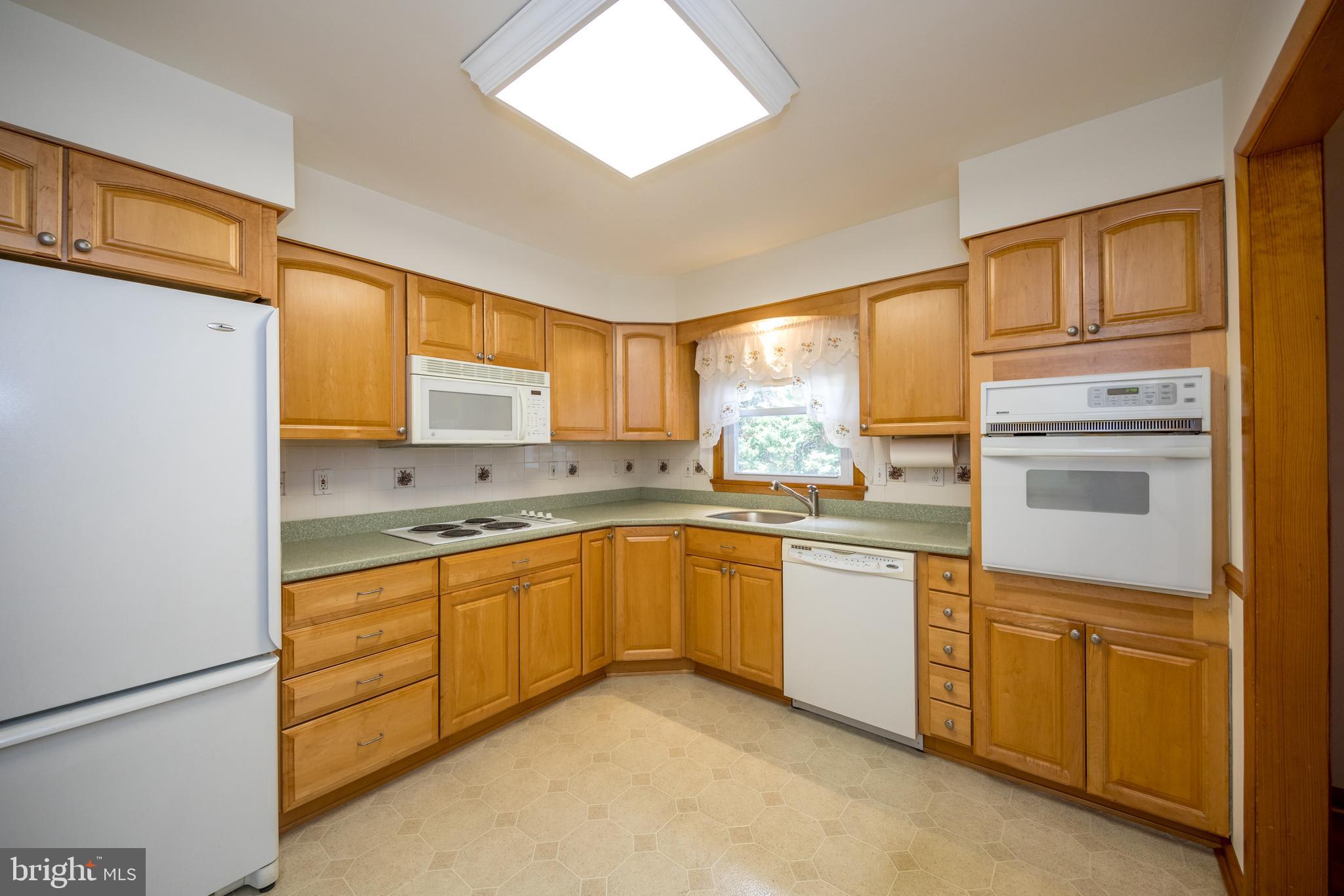 40 Telestar Way Havre de Grace, MD 21078 - Photo 11 of 33 a kitchen with stainless steel appliances granite countertop a sink and cabinets