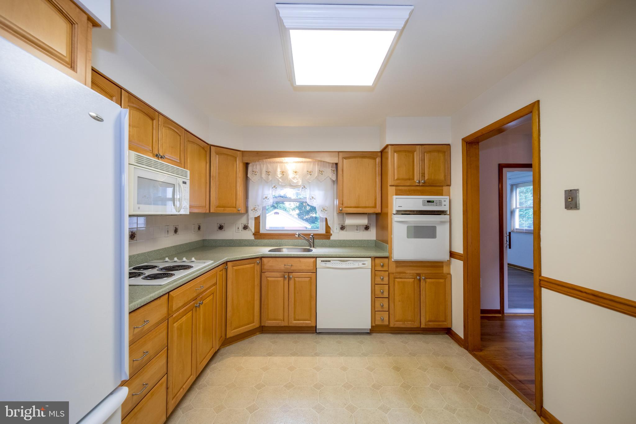 40 Telestar Way Havre de Grace, MD 21078 - Photo 12 of 33 a kitchen with stainless steel appliances granite countertop a refrigerator and a sink