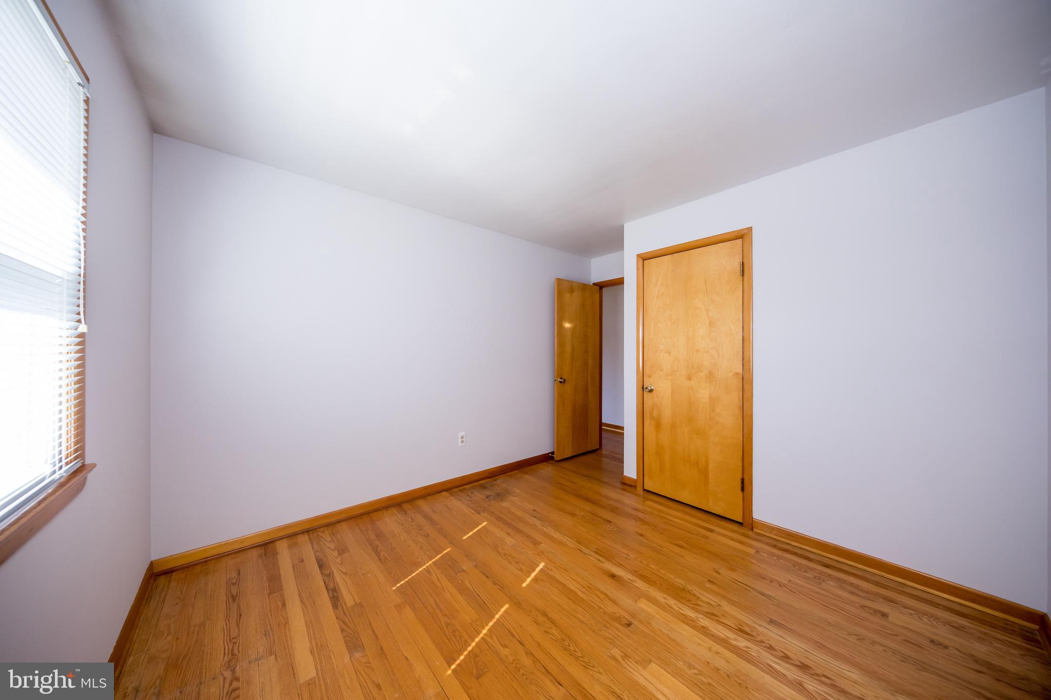 40 Telestar Way Havre de Grace, MD 21078 - Photo 20 of 33 a view of an empty room with wooden floor and a window