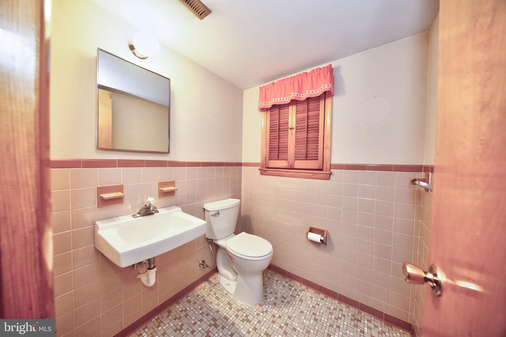 40 Telestar Way Havre de Grace, MD 21078 - Photo 27 of 33 a bathroom with a sink a toilet and a mirror