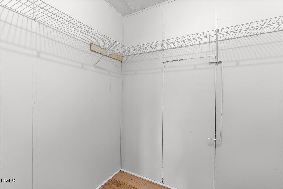 1111 Stoney Mountain Road Rougemont, NC 27572 - Photo 19 of 30 a view of a room with shelf