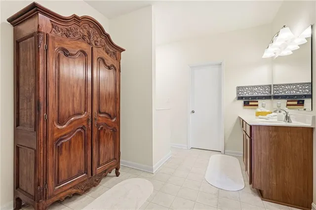 a view of cabinet with washer and dryer