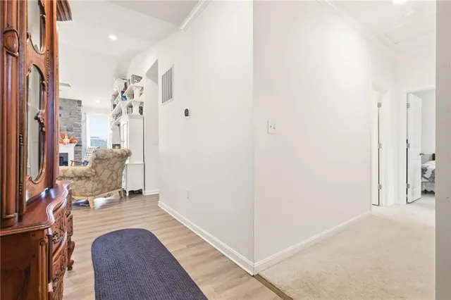 a view of living room with furniture and a flat screen tv