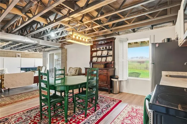 a outdoor space with lots of furniture and a shower