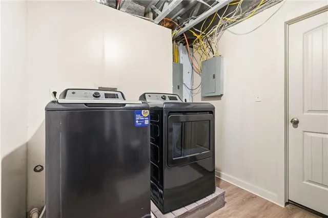 a utility room with dryer and washer