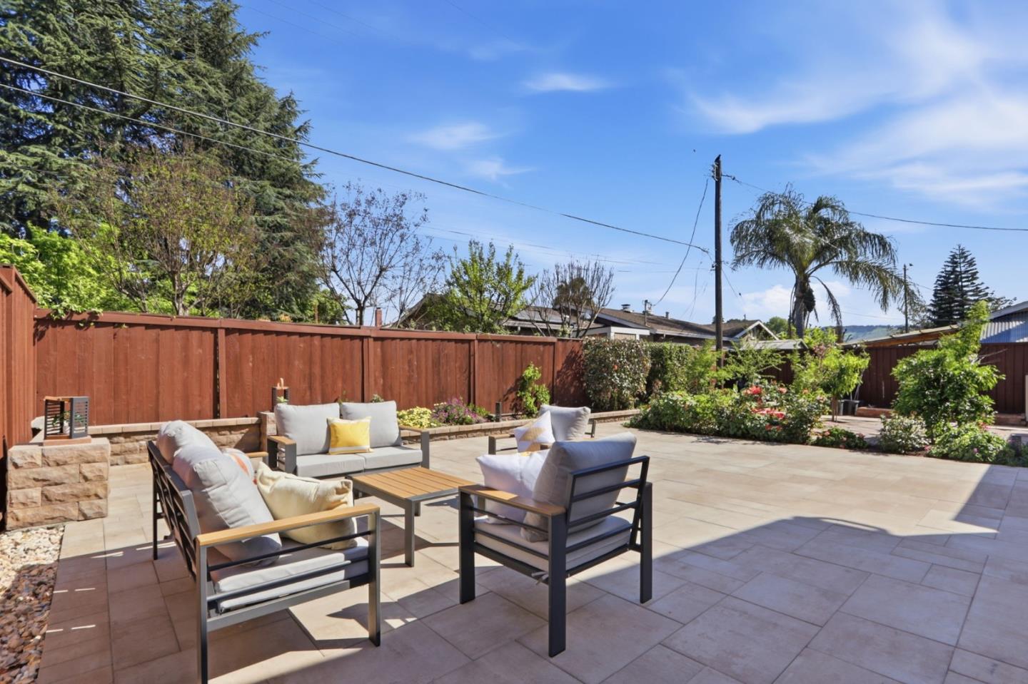 5888 Lean Way San Jose, CA 95123 - Photo 47 of 54 a view of a chairs and tables in the back yard of the house