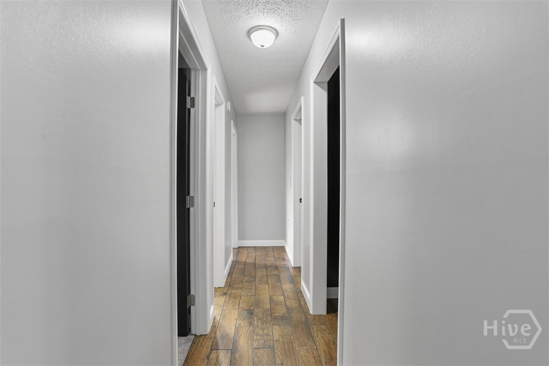 13506 Rockingham Road Savannah, GA 31419 - Photo 18 of 46 Hallway to Bathroom and Bedrooms