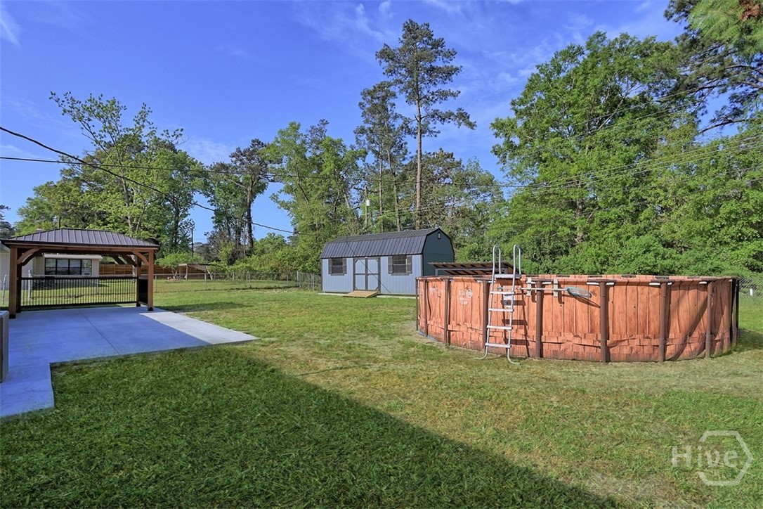 13506 Rockingham Road Savannah, GA 31419 - Photo 37 of 46 Backyard with Above Ground Pool View