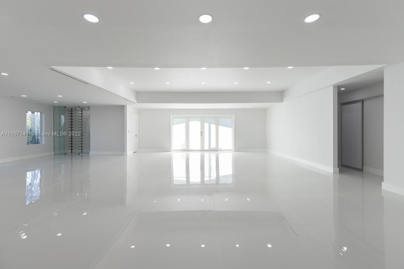 4730 Bay Point Road Miami, FL 33137 - Photo 6 of 25 a view of an empty room with a window