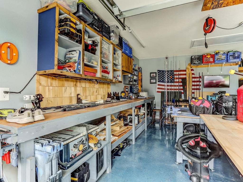 88358 Maybourne Road Yulee, FL 32097 - Photo 21 of 27 a utility room with dryer and bicycles