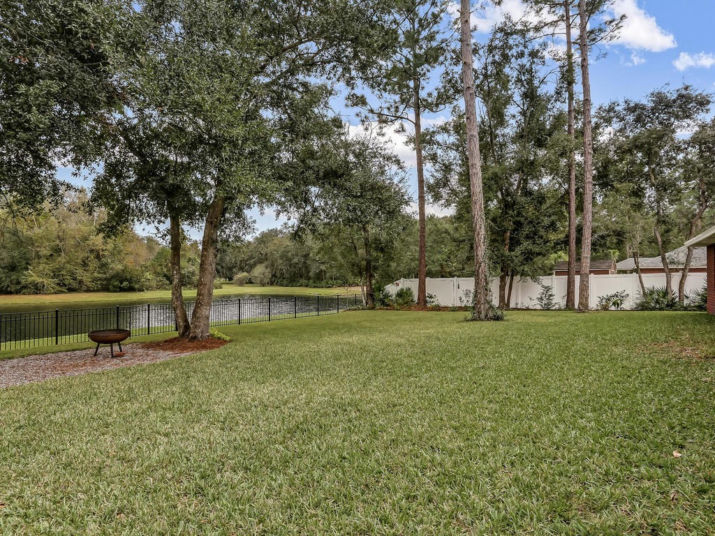 88358 Maybourne Road Yulee, FL 32097 - Photo 27 of 27 a view of a park with large trees