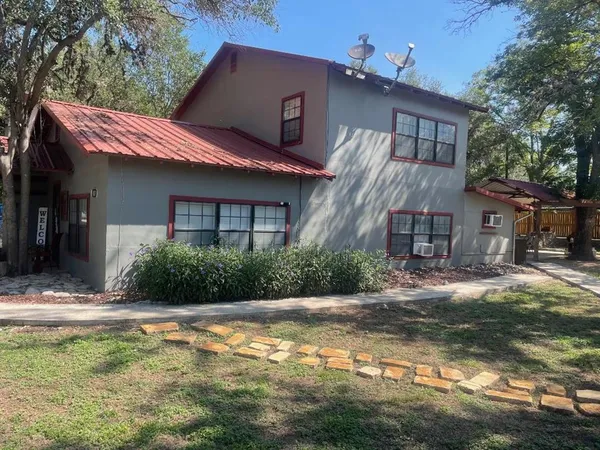 a view of a house with a patio