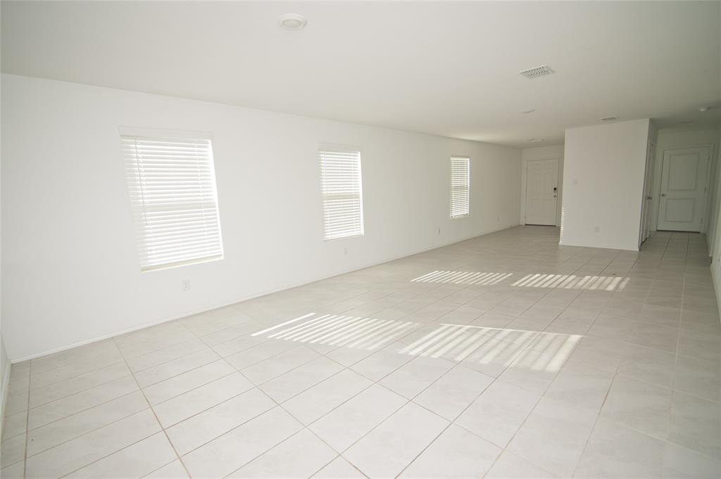 3701 Harper Street Little Elm, TX 75068 - Photo 14 of 26 an empty room with windows