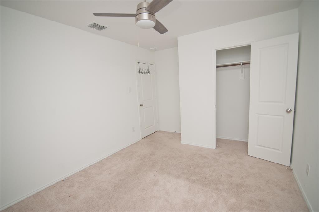 3701 Harper Street Little Elm, TX 75068 - Photo 19 of 26 an empty room with closet area