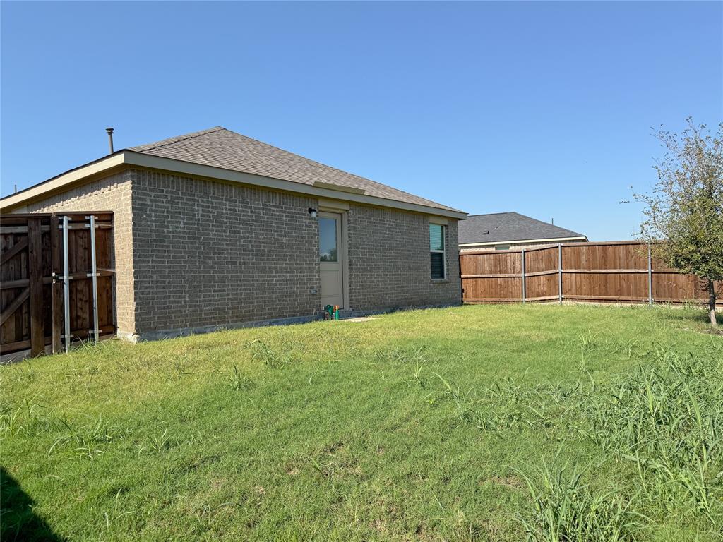 3701 Harper Street Little Elm, TX 75068 - Photo 24 of 26 a front view of house with yard