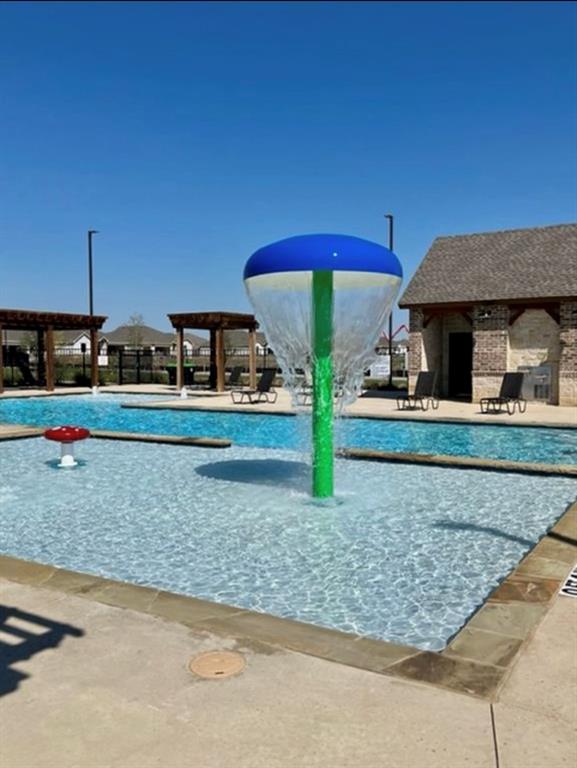 3701 Harper Street Little Elm, TX 75068 - Photo 25 of 26 a front view of a house with porch