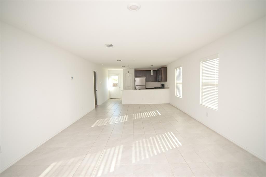 3701 Harper Street Little Elm, TX 75068 - Photo 3 of 26 a view of an empty room and window