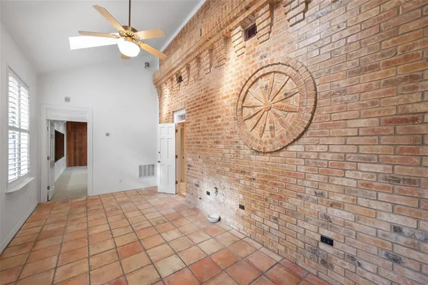 a kitchen with stainless steel appliances granite countertop a stove and a sink