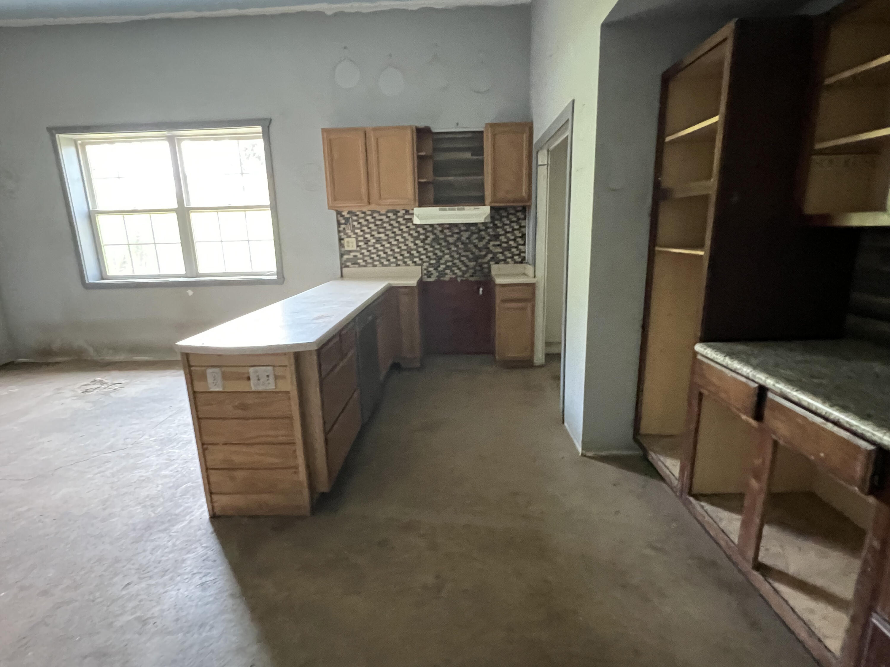 4104 Cooley Drive Pace, FL 32571 - Photo 21 of 21 a kitchen with a sink stove and refrigerator