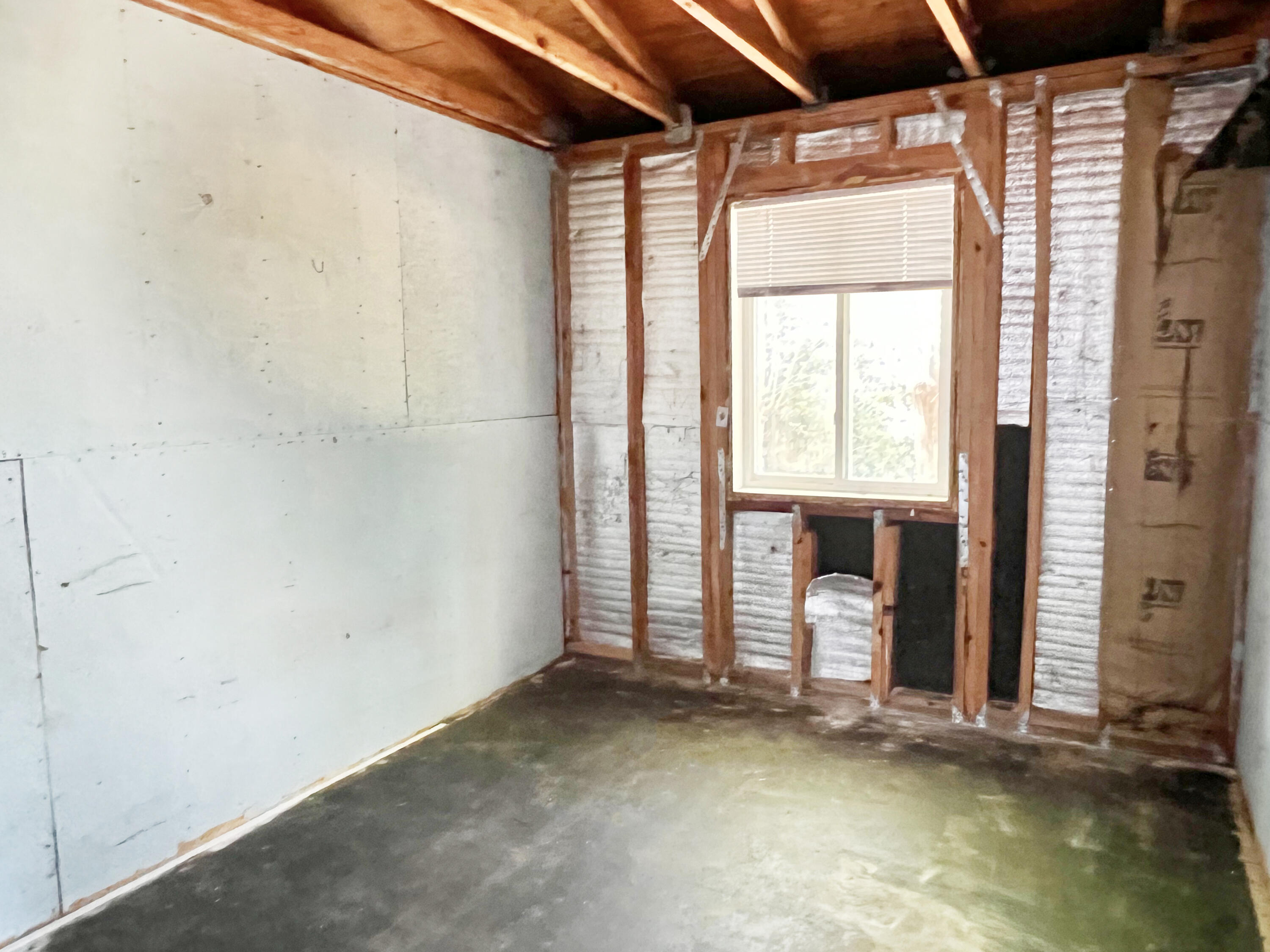 4104 Cooley Drive Pace, FL 32571 - Photo 8 of 21 a view of a room with wooden floor and windows