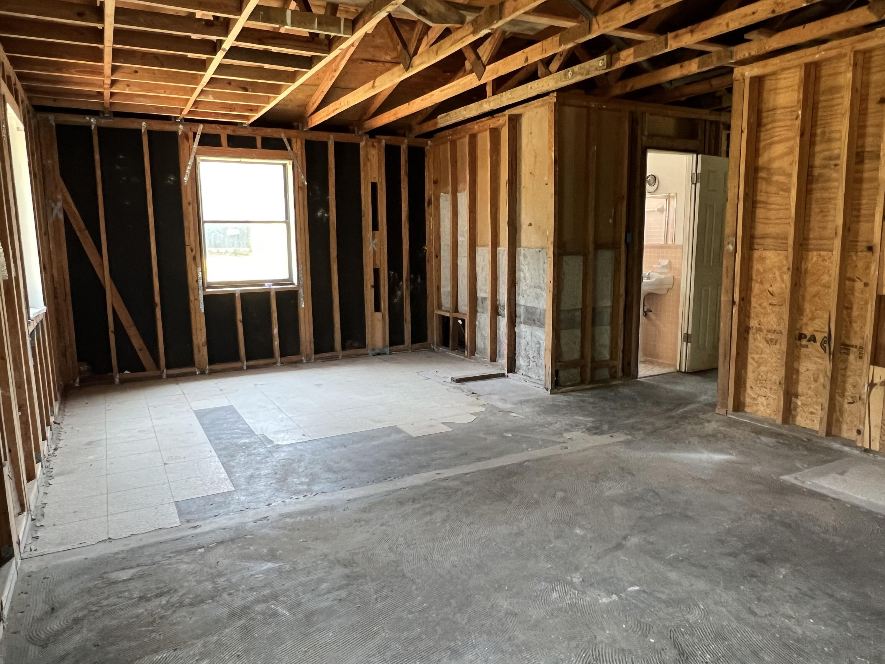 4104 Cooley Drive Pace, FL 32571 - Photo 10 of 21 an empty room with windows