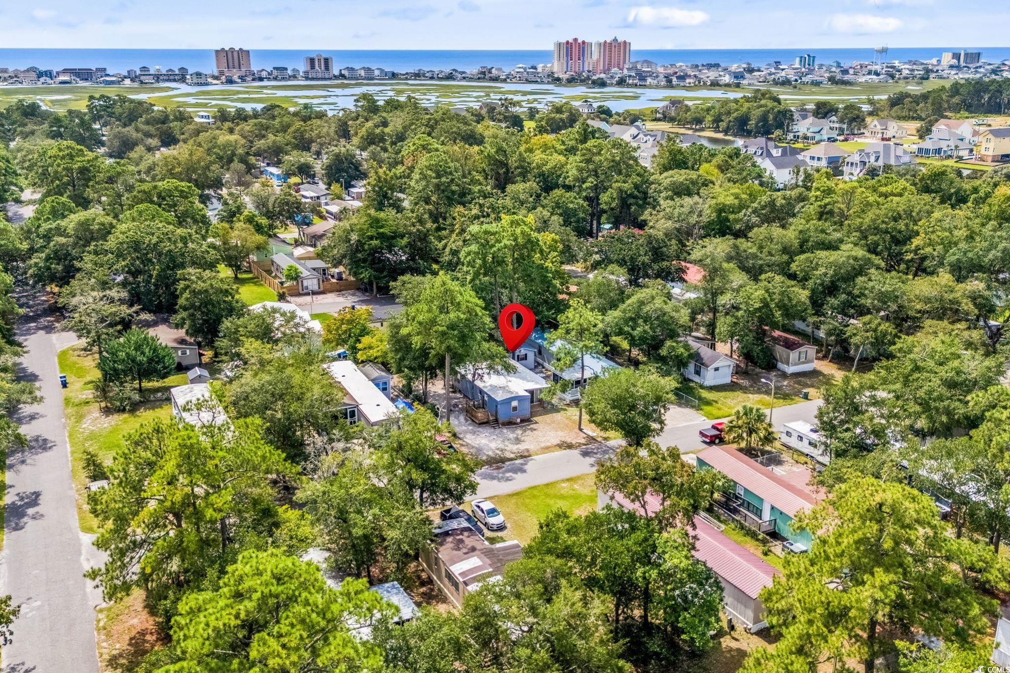 4516 Willet Street North Myrtle Beach, SC 29582 - Photo 39 of 40 Aerial view of residential area with a nearby body of water