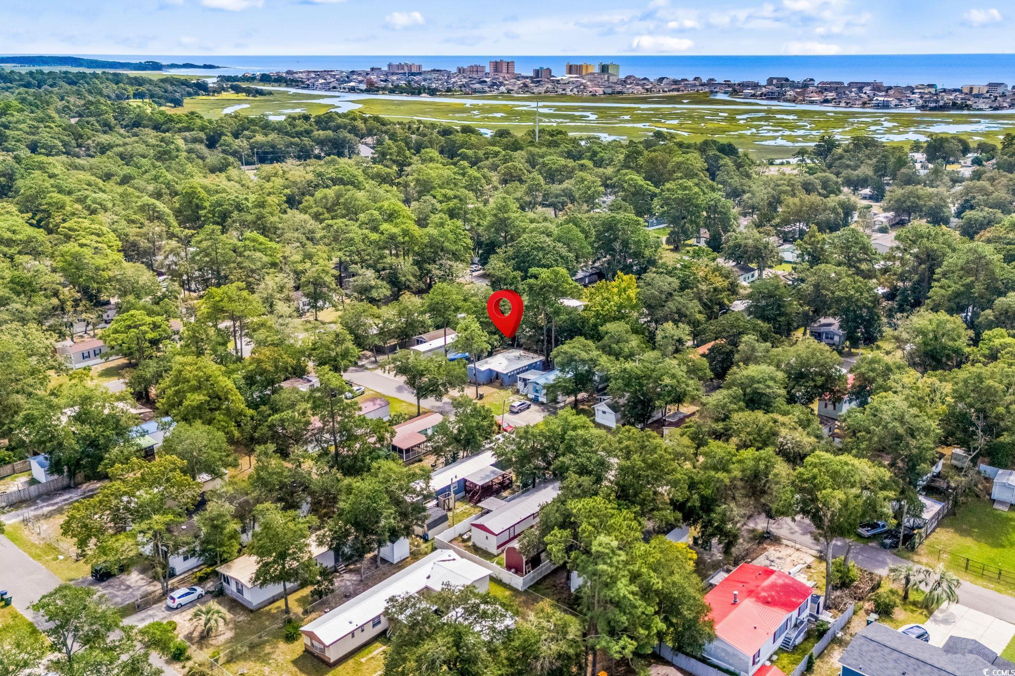 4516 Willet Street North Myrtle Beach, SC 29582 - Photo 40 of 40 Aerial perspective of suburban area featuring a large body of water