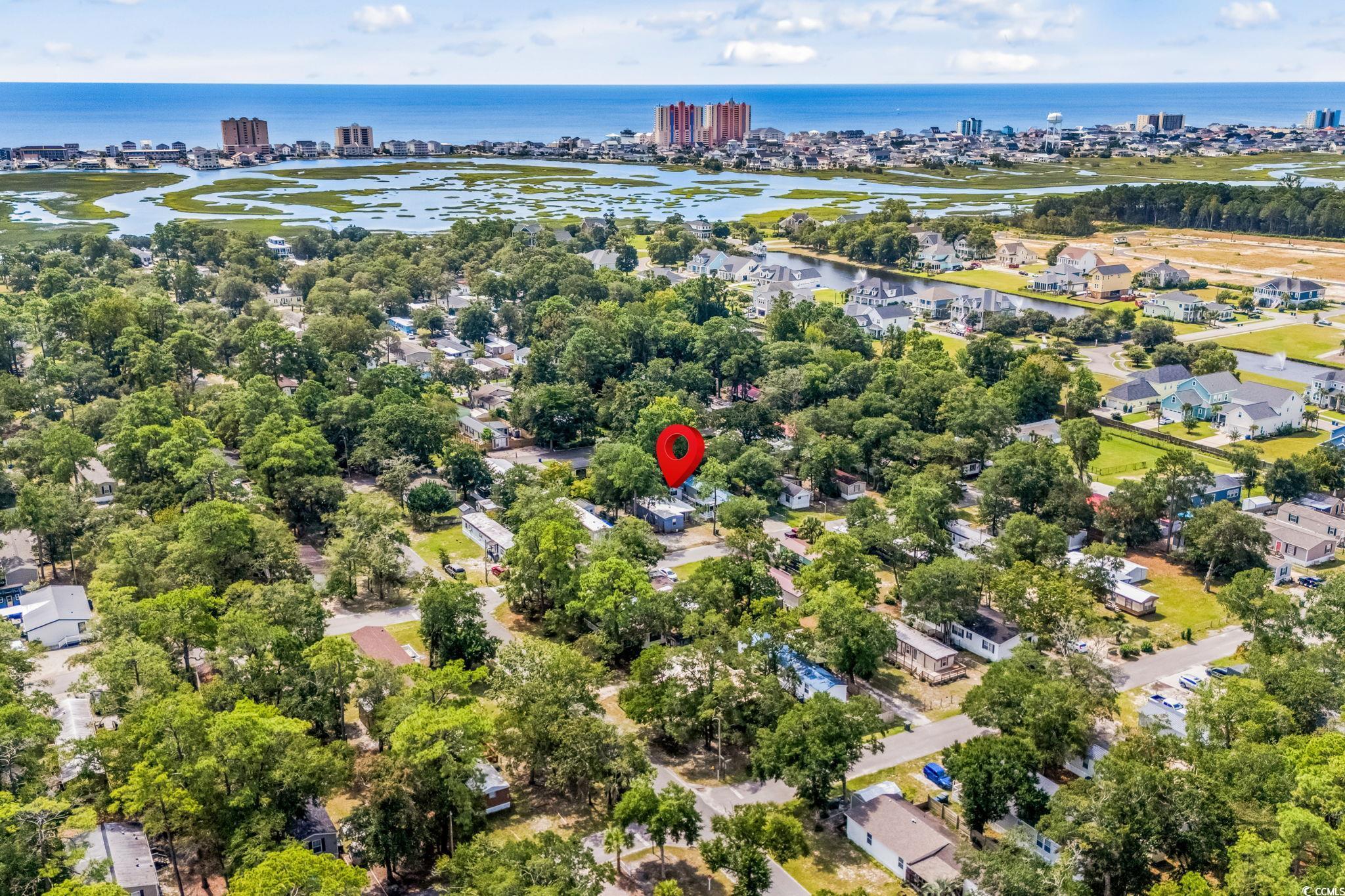 4516 Willet Street North Myrtle Beach, SC 29582 - Photo 4 of 40 Aerial view of residential area featuring a nearby body of water