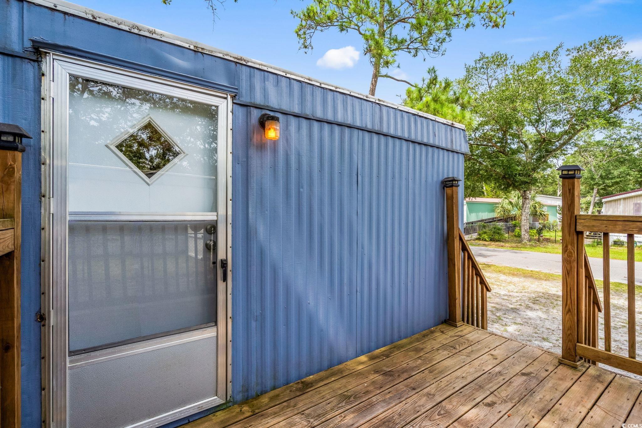 4516 Willet Street North Myrtle Beach, SC 29582 - Photo 9 of 40 View of wooden deck