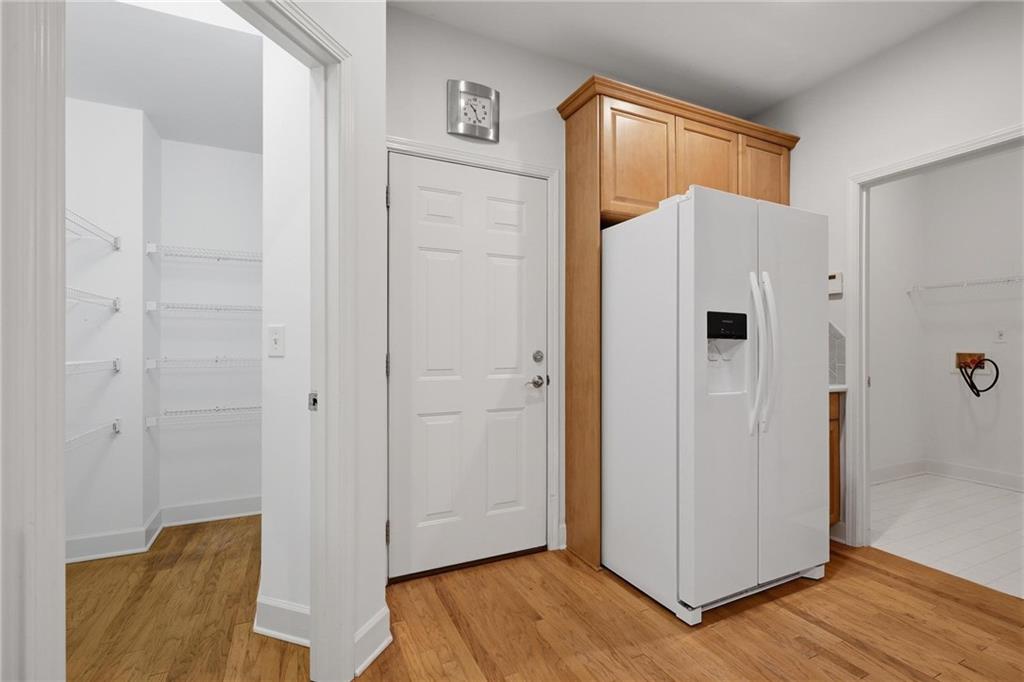 2017 MacLand Square Drive, Unit 9 Marietta, GA 30064 - Photo 11 of 30 a white refrigerator freezer sitting inside of a kitchen