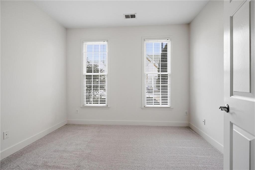 2017 MacLand Square Drive, Unit 9 Marietta, GA 30064 - Photo 21 of 30 a view of an empty room with a window
