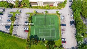 8305 Southwest 72nd Avenue, Unit 105A Miami, FL 33143 - Photo 23 of 25 an aerial view of a houses with outdoor space and street view