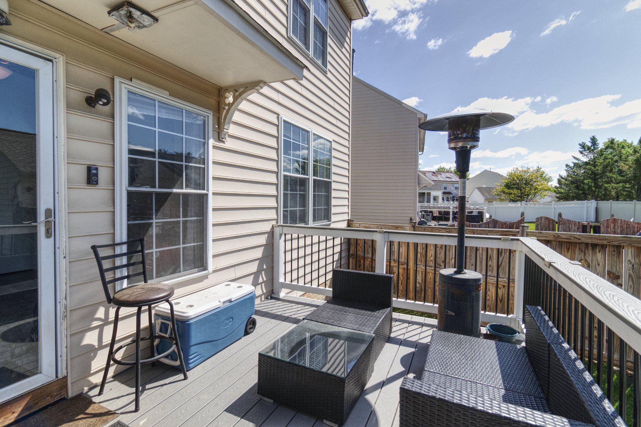 215 Seamaster Road Essex, MD 21221 - Photo 38 of 40 a balcony with furniture and a potted plant