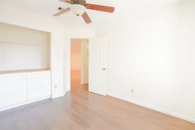 an empty room with cabinet