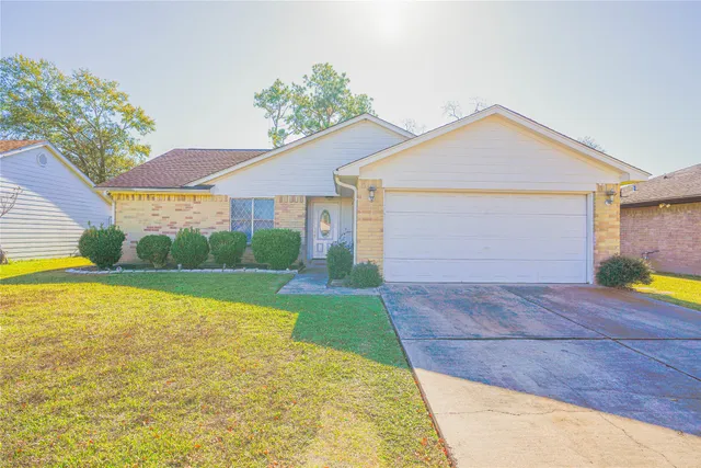 a view of an house with backyard space and swimming pool