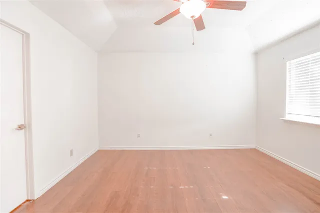 a view of a room that has a window