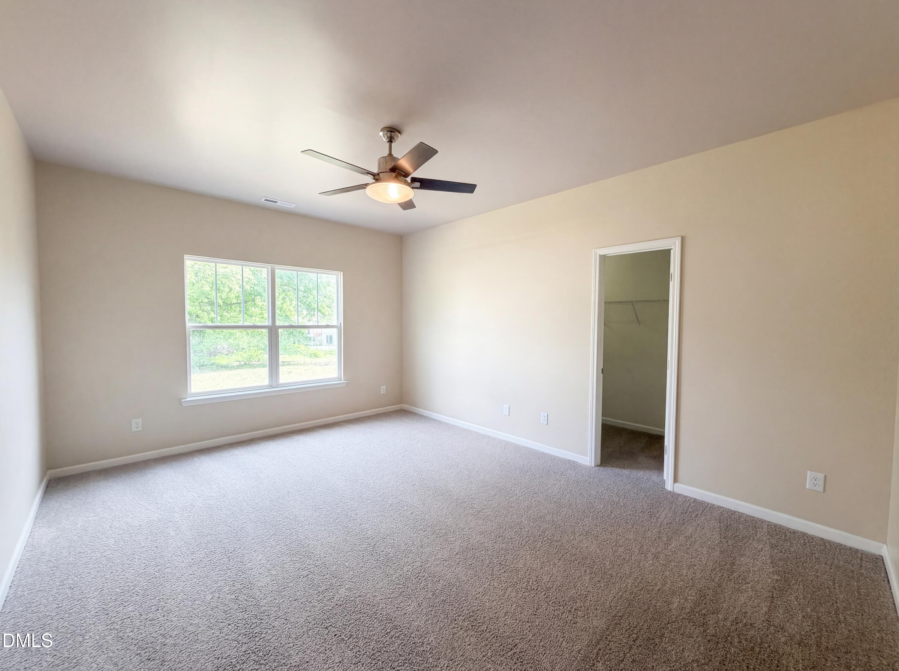 3712 Mayfair Mill Drive Raleigh, NC 27616 - Photo 4 of 16 a view of an empty room with a window