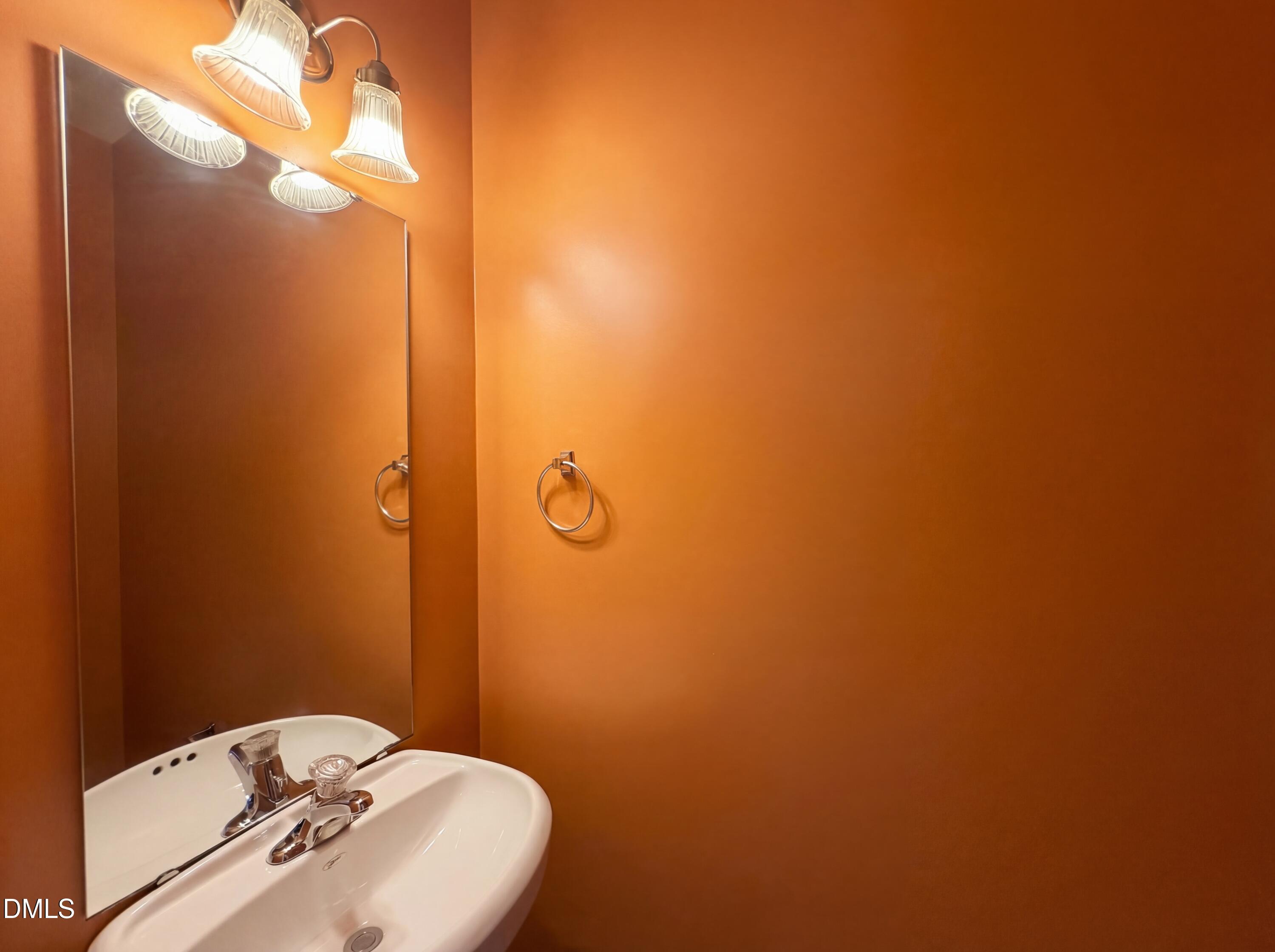 3712 Mayfair Mill Drive Raleigh, NC 27616 - Photo 10 of 16 a bathroom with a sink and shower