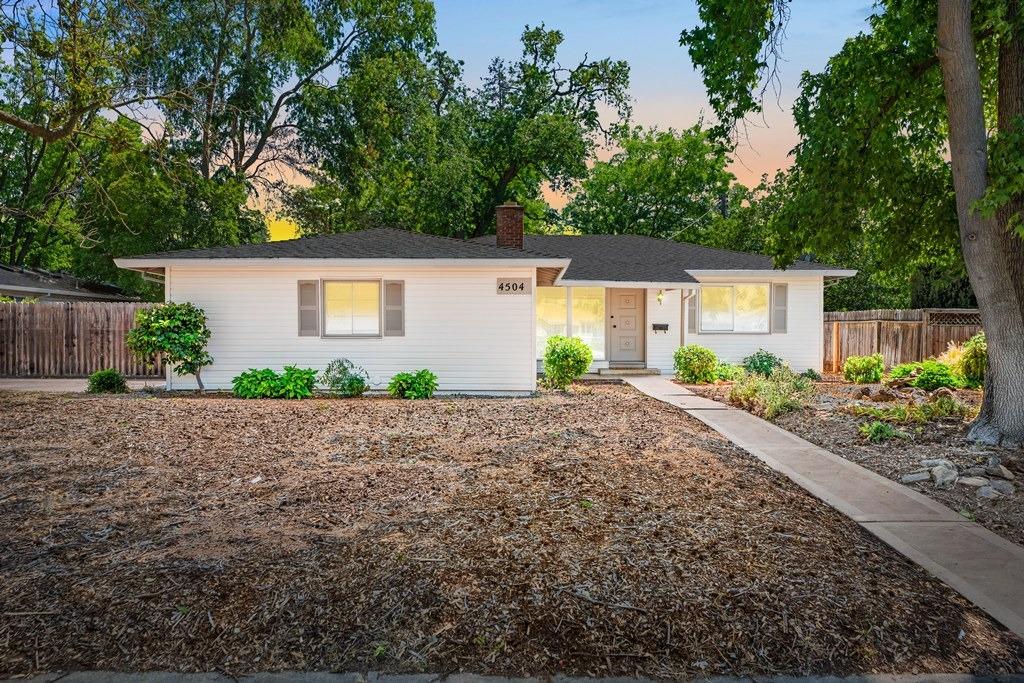 4504 McDonald Drive Sacramento, CA 95821 - Photo 1 of 1 a front view of a house with garden