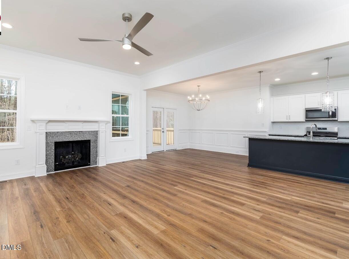 5 Arthur Wilder Road Spring Hope, NC 27882 - Photo 2 of 5 a view of kitchen with cabinets and wooden floor
