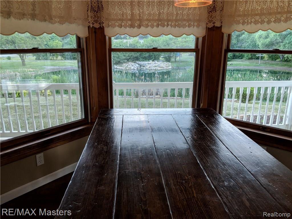 27754 Arsenal Road Flat Rock, MI 48134 - Photo 16 of 57 Dining Room and Pond view 2