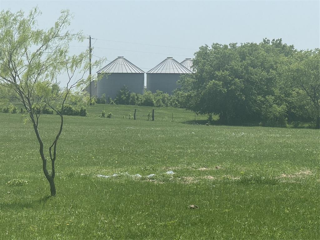 340 Private Road 2202 Decatur, TX 76234 - Photo 3 of 6 a view of a big yard with a house in the background