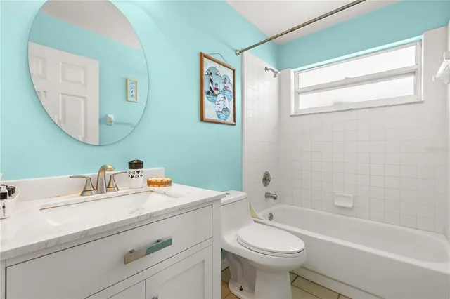 a bathroom with a sink a toilet and a bathtub