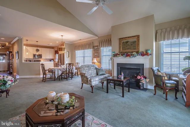 a view of a chairs and table in the balcony