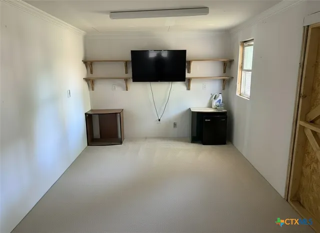 a view of workspace with flat screen tv