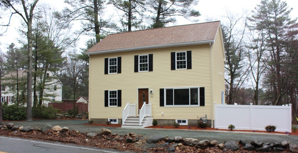 75 Baldwin Road Billerica, MA 01821 - Photo 1 of 30 a view of house with a yard