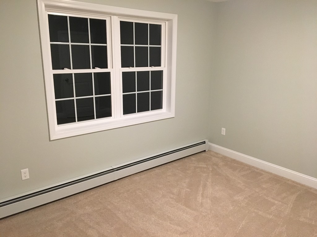 75 Baldwin Road Billerica, MA 01821 - Photo 18 of 30 a view of an empty room with a window