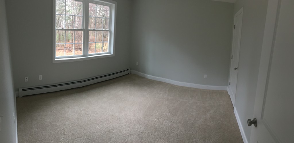 75 Baldwin Road Billerica, MA 01821 - Photo 28 of 30 an empty room with a window