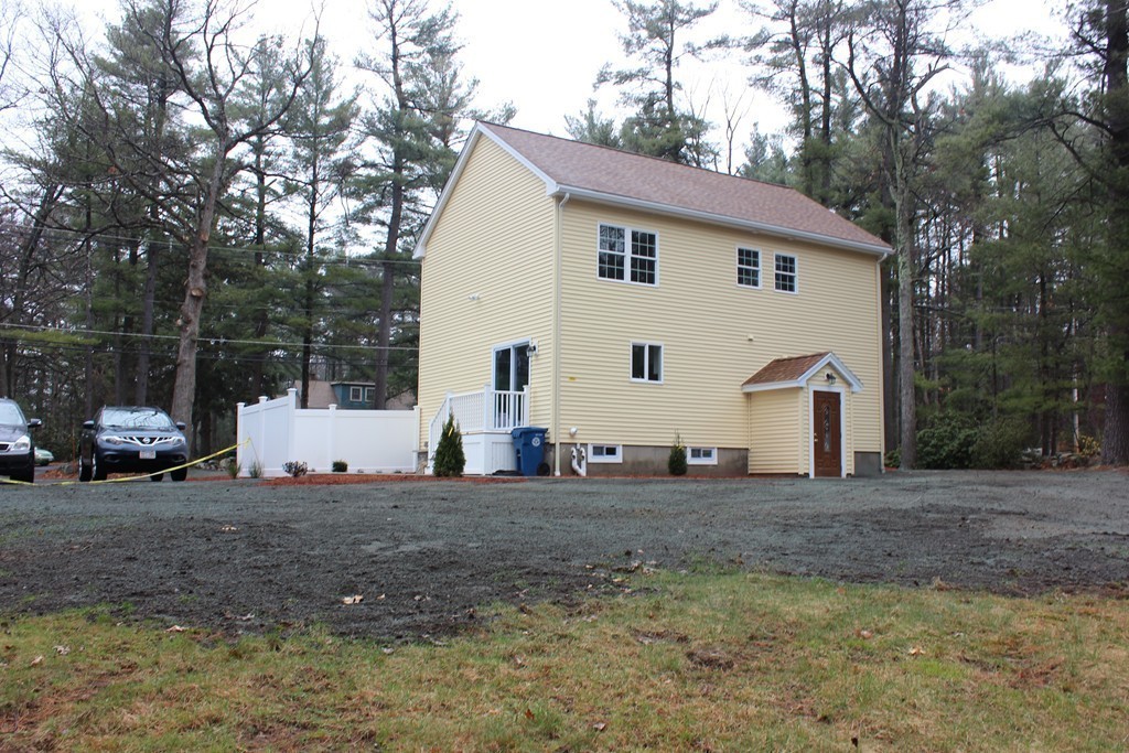 75 Baldwin Road Billerica, MA 01821 - Photo 6 of 30 a view of a house with a outdoor space